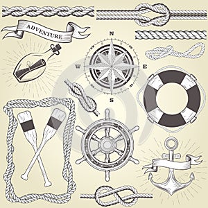 Vintage seafaring elements - steering wheel, oars, rope frame