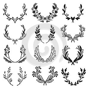 Vintage set of hand drawn rustic laurels. Floral vector graphic