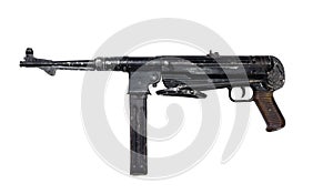 Vintage shabby submachine gun on white background