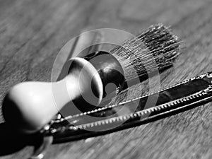 Vintage shaving brush and blade photo