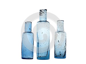 Vintage sheared lip old bottles, hand blown collectable antique. Isolated over white.