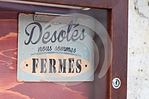 Vintage shop sign desole nous sommes ferme french text means sorry we are closed