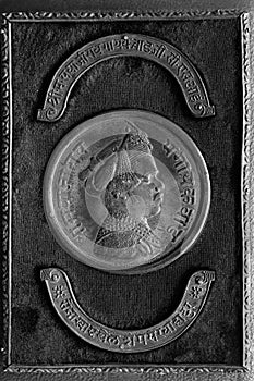 Vintage silver emblem on wooden Box
