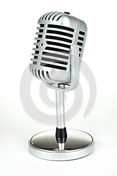 Vintage silver microphone on white