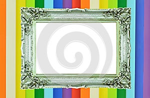 Vintage silver picture frame on colorful wall