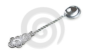 Vintage silverware, old, rich decorated teaspoon, spoon for sugar, isolated on a white, close up