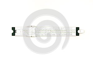 vintage slide rule being used for calculation. top view