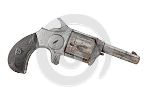 Vintage small revolver gun isolated.