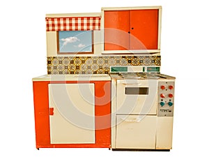 Vintage small seventies toy kitchen isolated on white