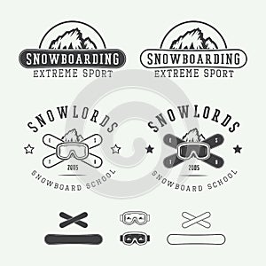 Vintage snowboarding logos, badges, emblems and design elements.