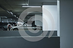 Vintage sports car on parking lot in garage.