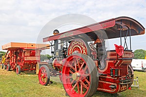 Vintage Steam Traction engine running a thresher