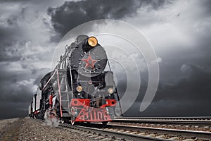 Vintage steam train in motion