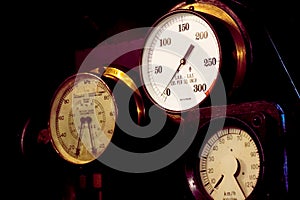 Vintage steam train pressure guage. Locomotive instrumentation dials in close-up