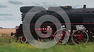 Vintage steam train on the railroad seamless looped