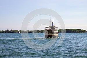 Vintage steamer ship departs from the port Toronto. Untitled