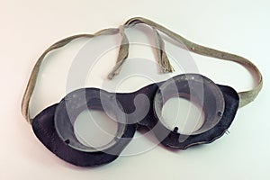 Vintage steampunk leather safety googles with ropes for tying at back of the head