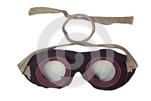 Vintage steampunk leather safety googles with ropes for tying at back of the head. back side. isolated on white background