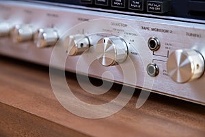 Vintage Stereo Tuner Receiver Amplifier Front Panel Controls Angled View Closeup