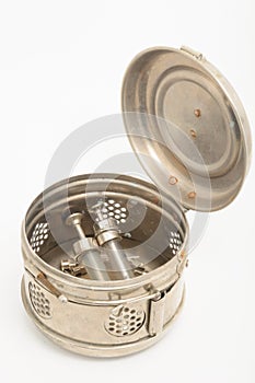 Vintage sterilisation container on white background