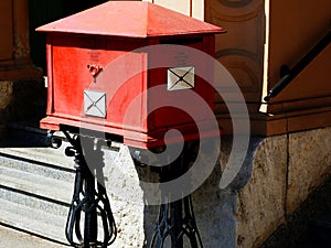 Vintage stile old weathered red metal mail and letter collection box