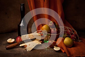 Vintage still life with alcohol and apples