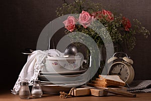 Vintage still life with a tureen and a bouquet