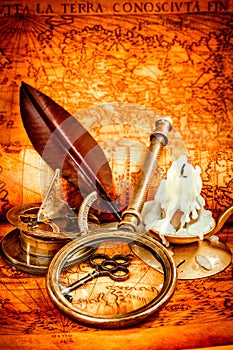 Vintage still life. Vintage items on ancient map.