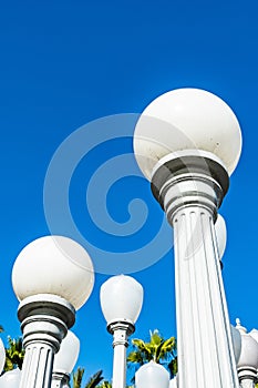 Vintage street lamps and blue sky in California