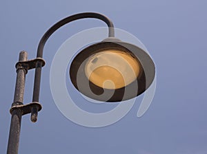 Vintage streetlamp and blue sky