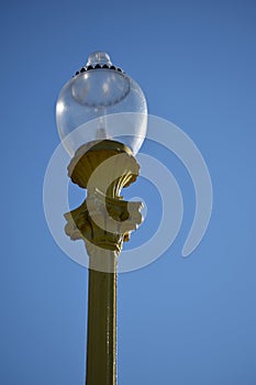 Vintage streetlamp on the territory of Moscow State University against the sky