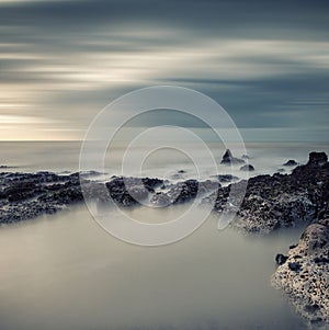 Vintage style cross processed seascape long exposure