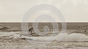 Vintage style photography of young surfers