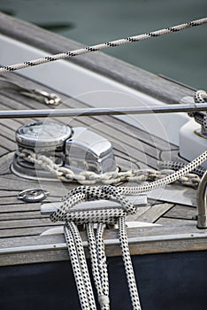 Vintage style picture of beautiful sail boat details. Rope, hull