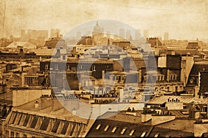 Vintage style picture of the roofs of Paris