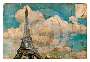 Vintage style postcard from Paris with Eiffel Tower. Grunge text