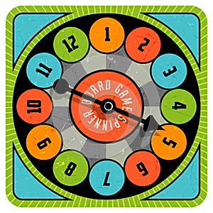 Vintage style spinner for board game with spinning arrow, numbers, and letters.
