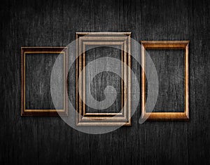 Vintage style wood framework over old black wall background. Space for text. 3d illustration