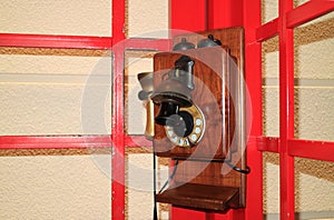 Vintage style wooden public telephone