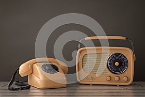 Vintage Styled Rotary Phone with Retro Radio. 3d Rendering