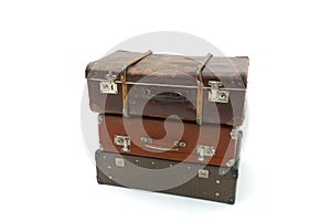 Vintage Suitcase over a white background. Isolated