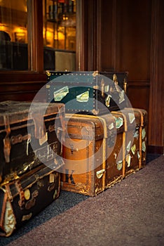 Vintage Suitcases and Trunks In the Lobby of a Luxury Hotel in Europe