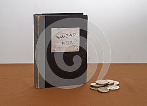 Vintage swear box, with Euros. New Year Resolution maybe.