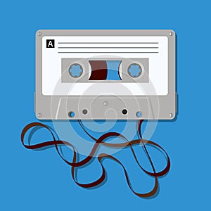 The vintage symbol of an audio cassette with the tape unwound.