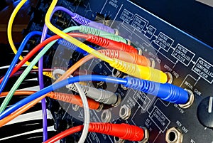 Vintage synthesizer with colorful path cables