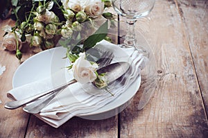 Vintage table setting with roses