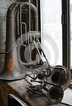 Vintage tarnished antique wind instrument with a beautiful patina as decorations trumpet horns