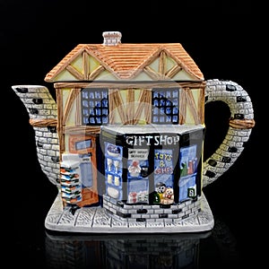 Vintage teapot in the shape of a house. retro chainfe service. coffee service.