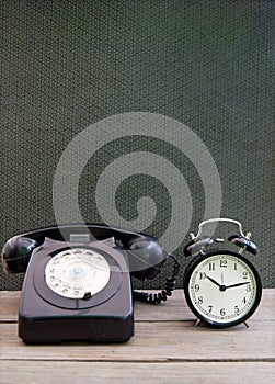 Vintage telephone, clock