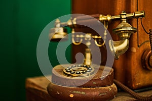 Vintage telephone, old retro radio on wood table